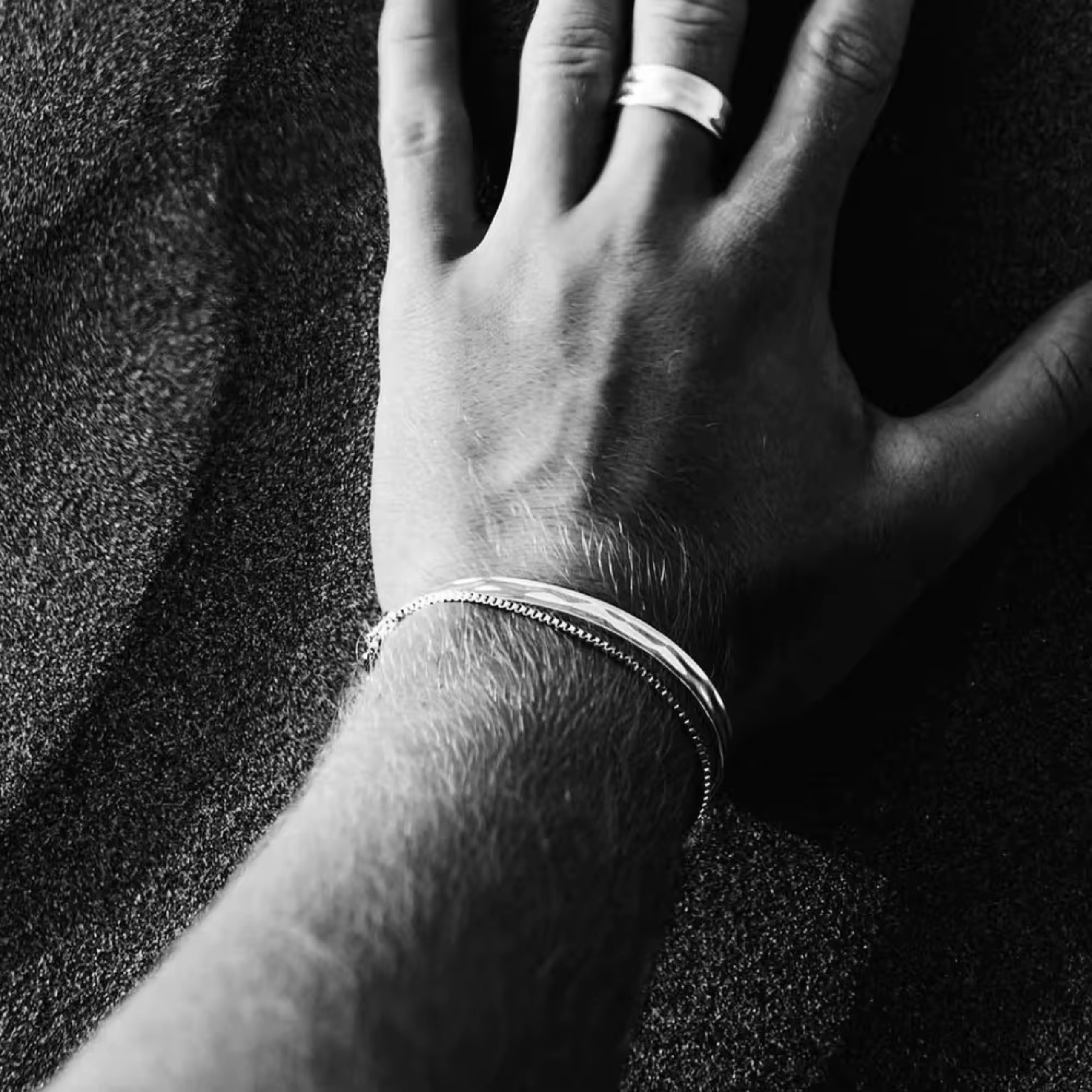 Silver stainless steel bracelet with minimalist design, waterproof, durable, and hypoallergenic – perfect for everyday wear