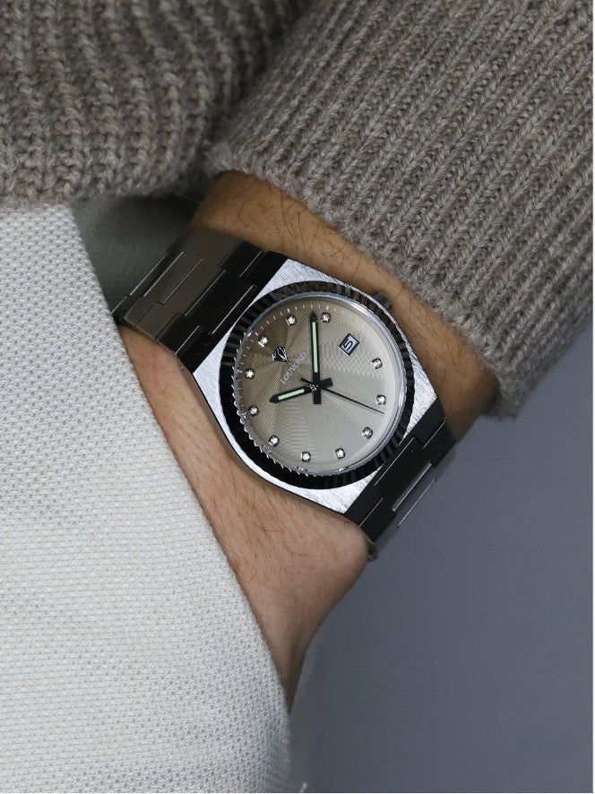 Man wearing Lenor Graphite watch with sleek graphite dial and durable stainless steel strap