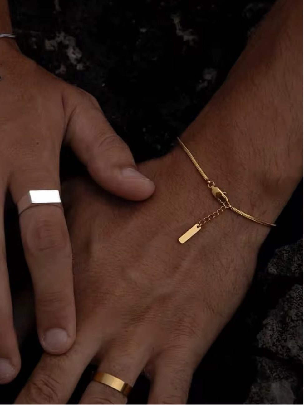 Set of men's gold bracelet and silver ring