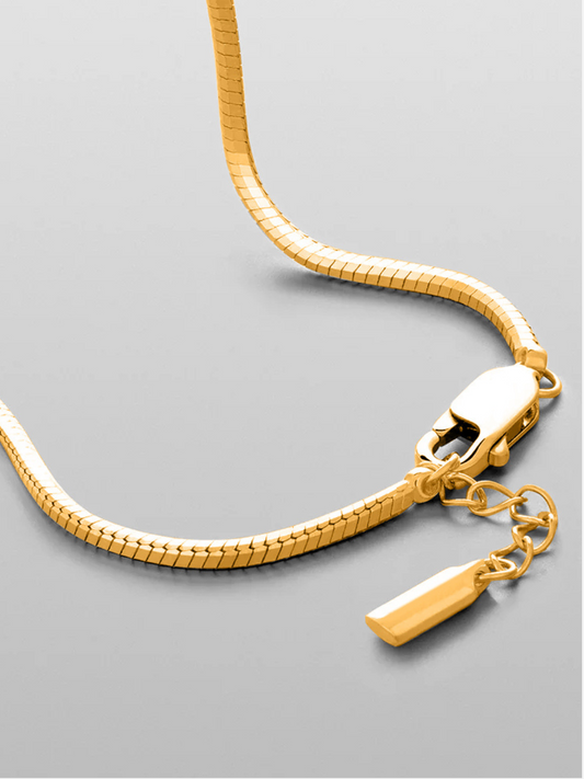 gold stainless steel bracelet featuring a minimalist design, waterproof, hypoallergenic, lightweight, and built for everyday wear