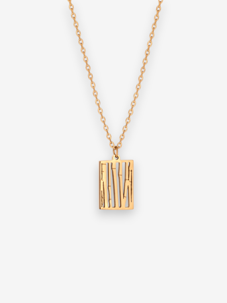 LOUVOND goudkleurige ketting met een rechthoekige hanger voorzien van een artistiek opengewerkt patroon