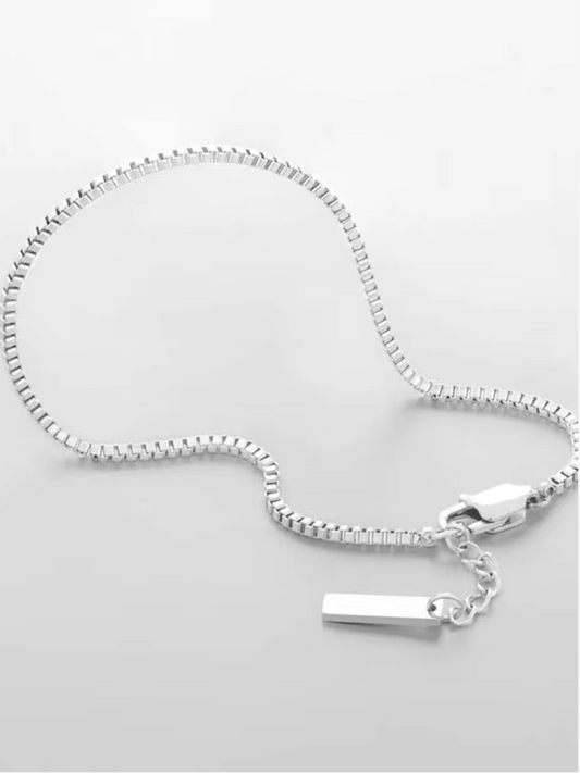 Minimalist silver stainless steel bracelet with square links, waterproof, durable, and hypoallergenic