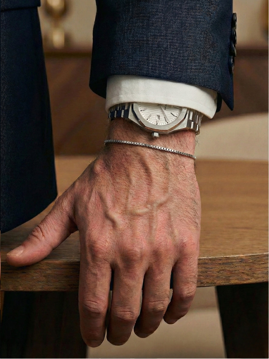 man wearing louvond jewelry, premium materials.