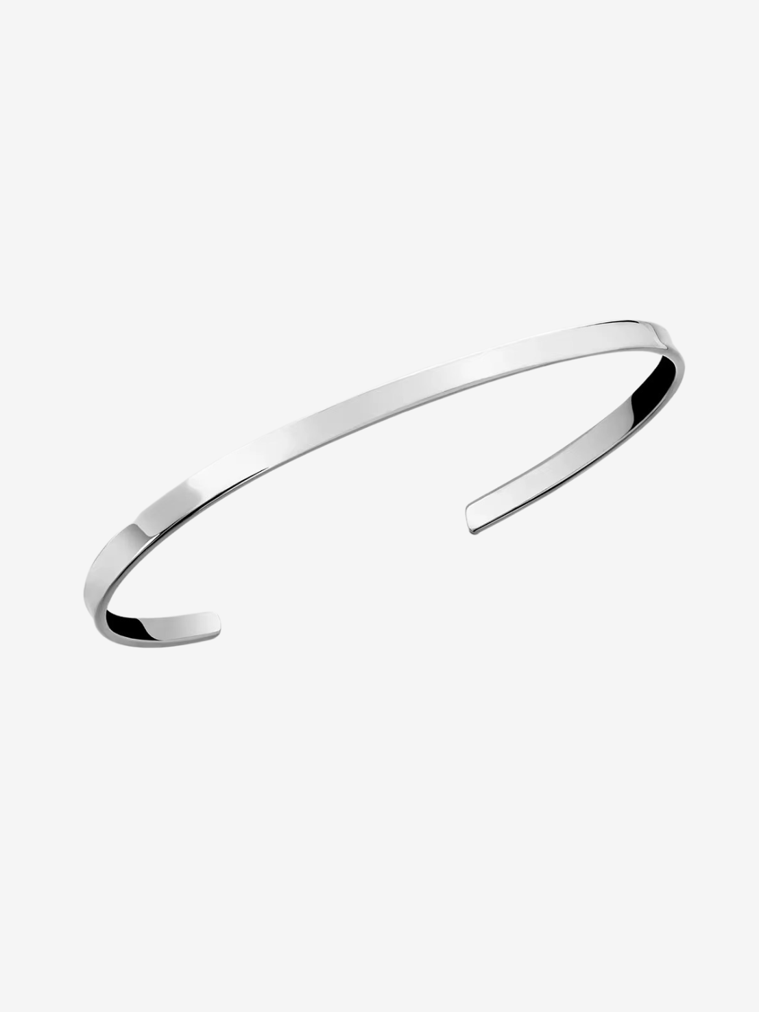 Modern silver cuff link bracelet with polished finish
