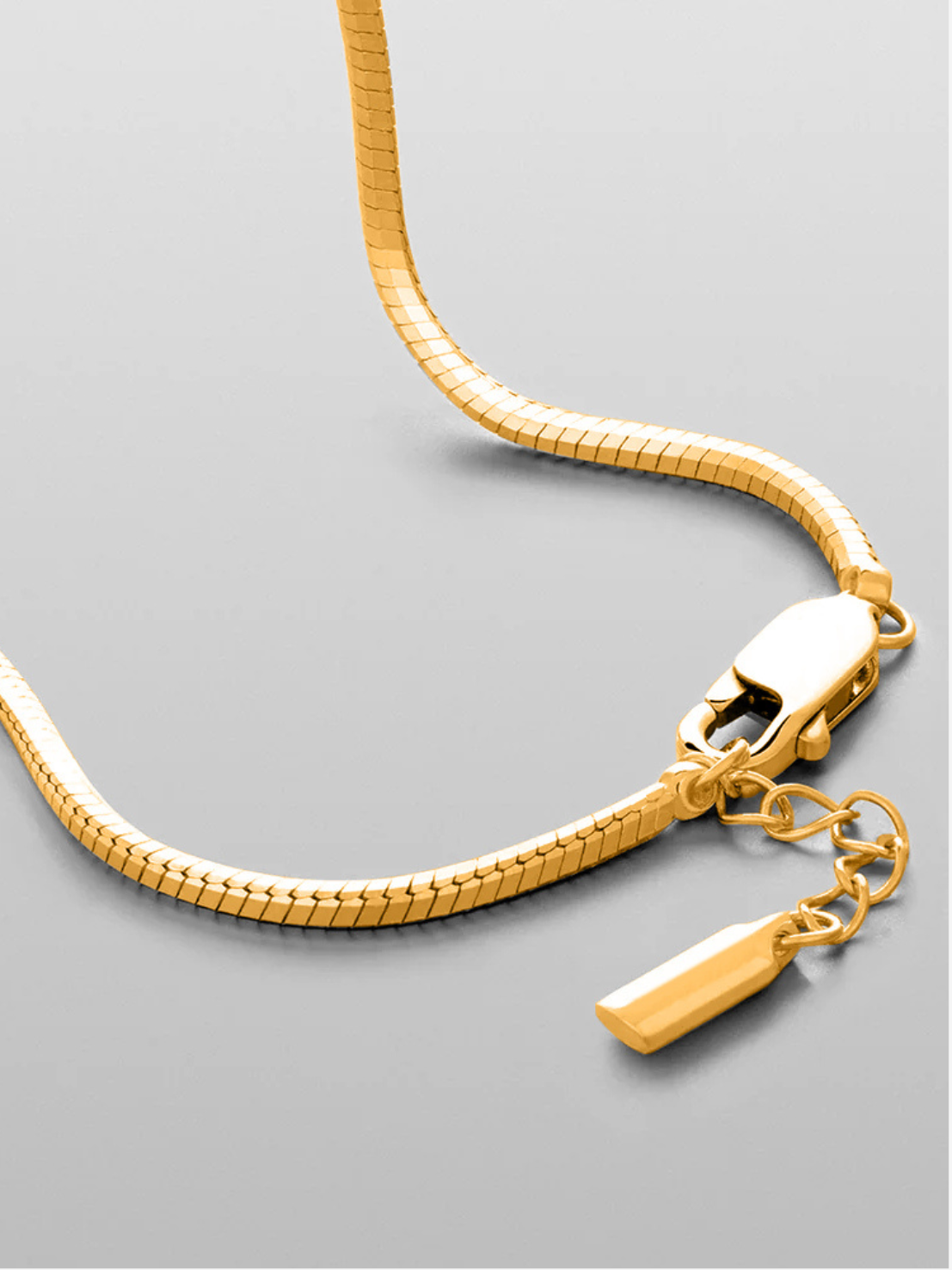 gold stainless steel bracelet featuring a minimalist design, waterproof, hypoallergenic, lightweight, and built for everyday wear