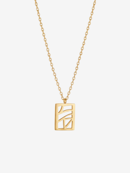 LOUVOND Labyrinth ketting met een rechthoekige goudkleurige hanger met abstract geometrisch opengewerkt design.
