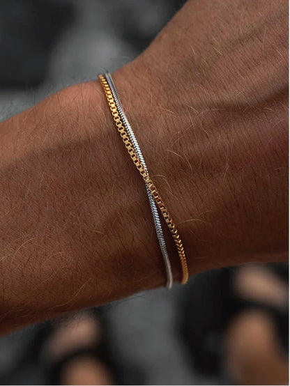 Set of men's gold and silver bracelet