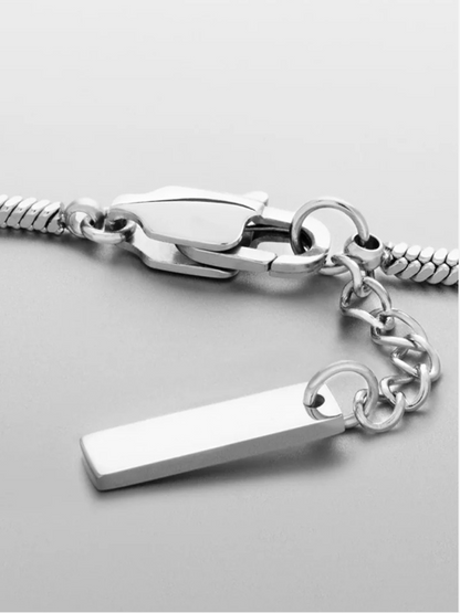 Sleek silver bracelet featuring a square link design, made from waterproof stainless steel, lightweight and hypoallergenic — perfect for daily wear