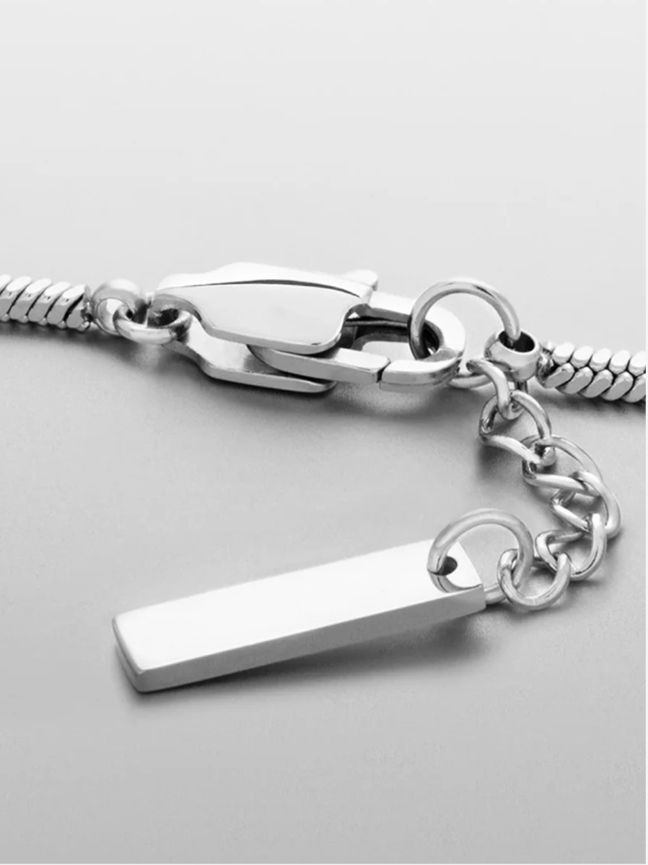 Sleek silver bracelet featuring a square link design, made from waterproof stainless steel, lightweight and hypoallergenic — perfect for daily wear